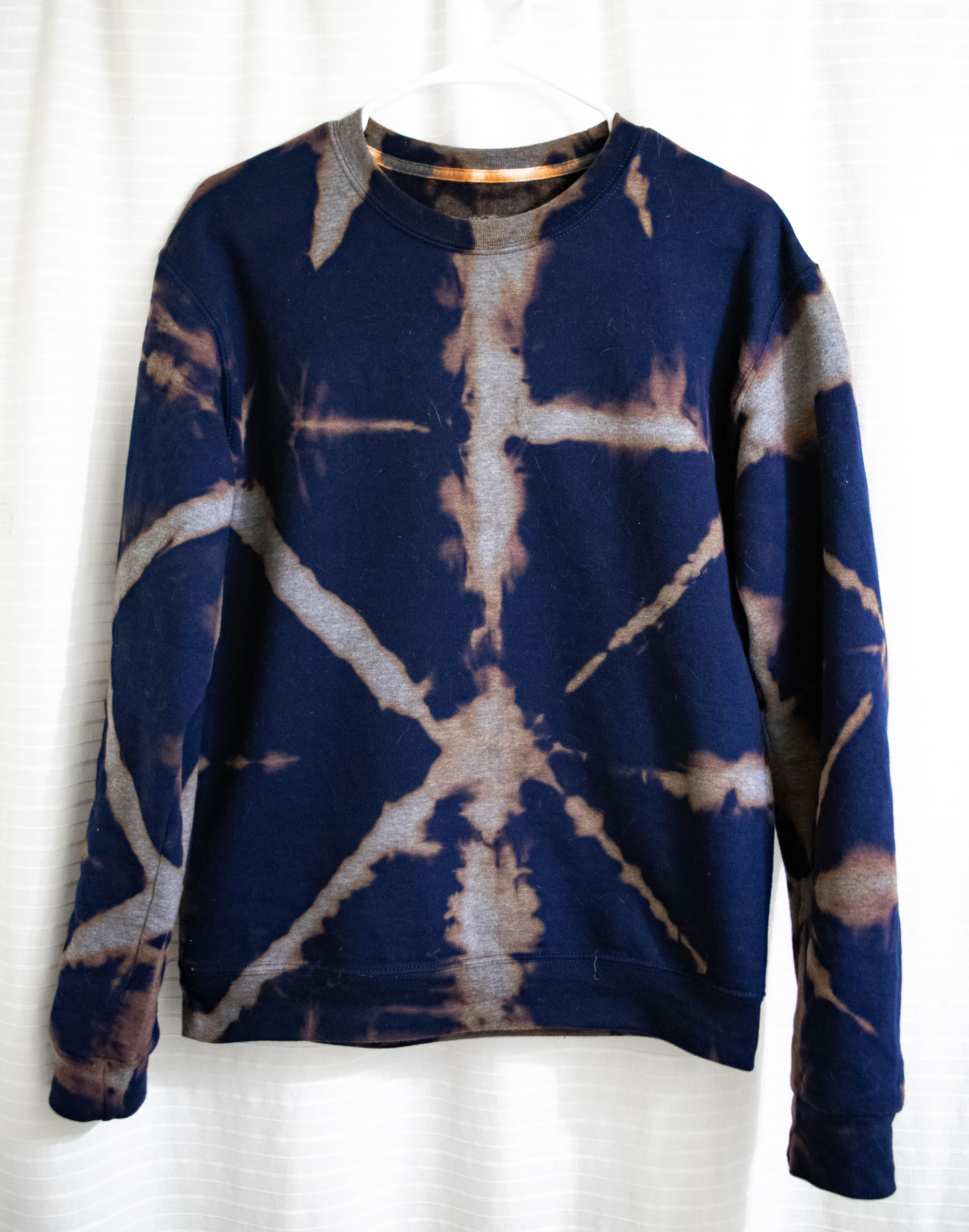 Reverse Tie Dye Sweatshirt Using the Shibori Method by Marissa Zingg